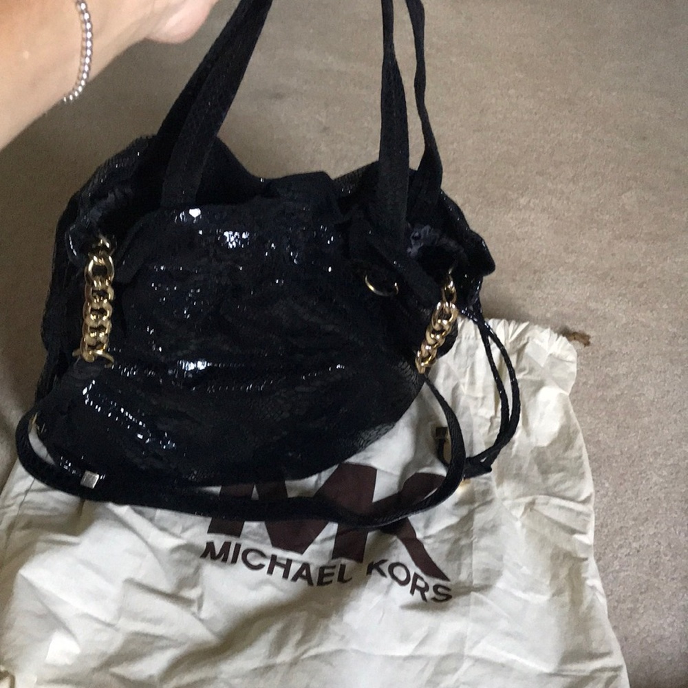 Michael Khoisan’s Handbag